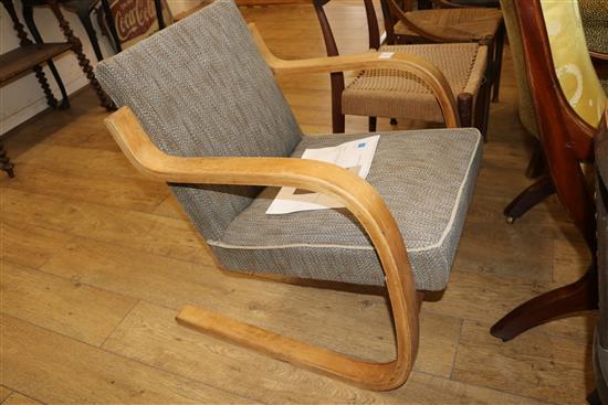An Alvar Aalto bentwood cantilever armchair, model 402 possibly for Finmar, stamped Made in Finland